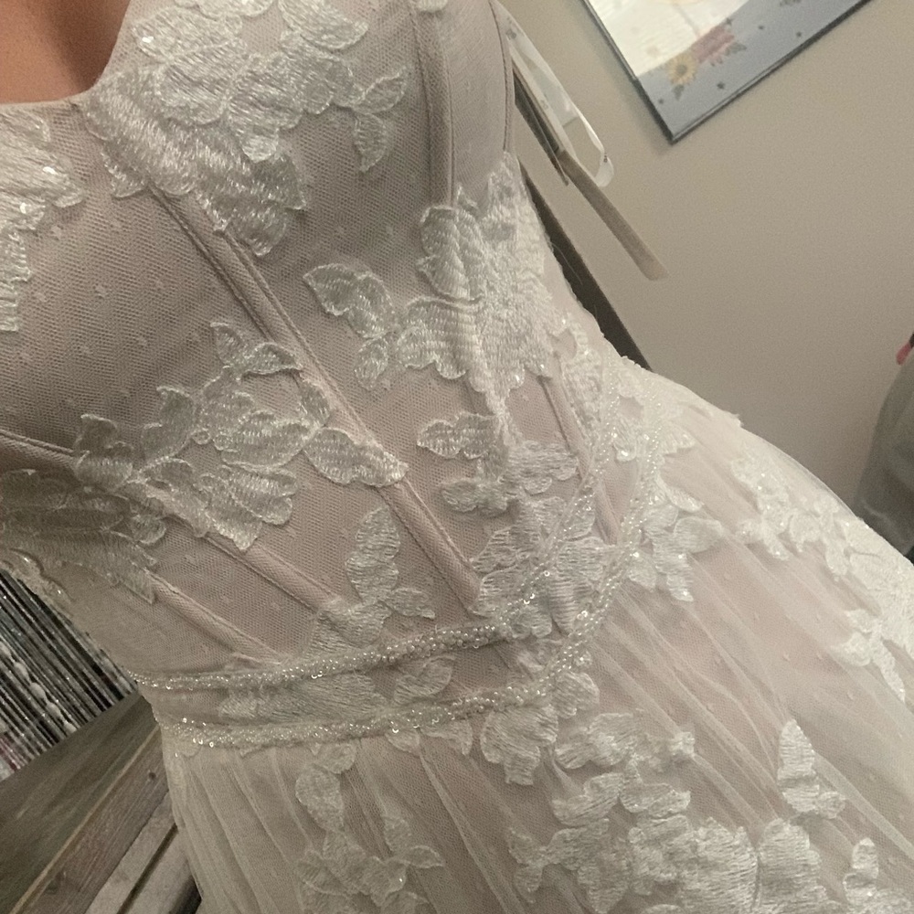 Brand New tags still on Beautiful wedding gown with adorable polka dot stitching